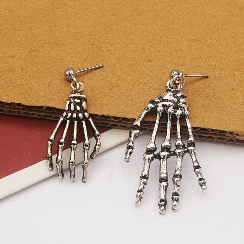 Women's Asymmetric Skull Hand Earrings